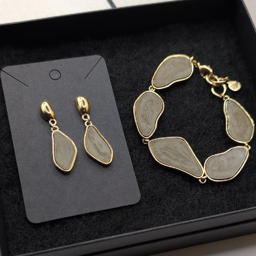 Erwin Pearl Greenish Grey Neutral tone and gold Leaf Drop Earrings + bracelet
